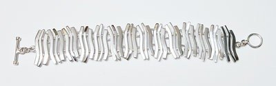 Zilveren Staafjes gebogen gehamerd ca. 19 cm armband 